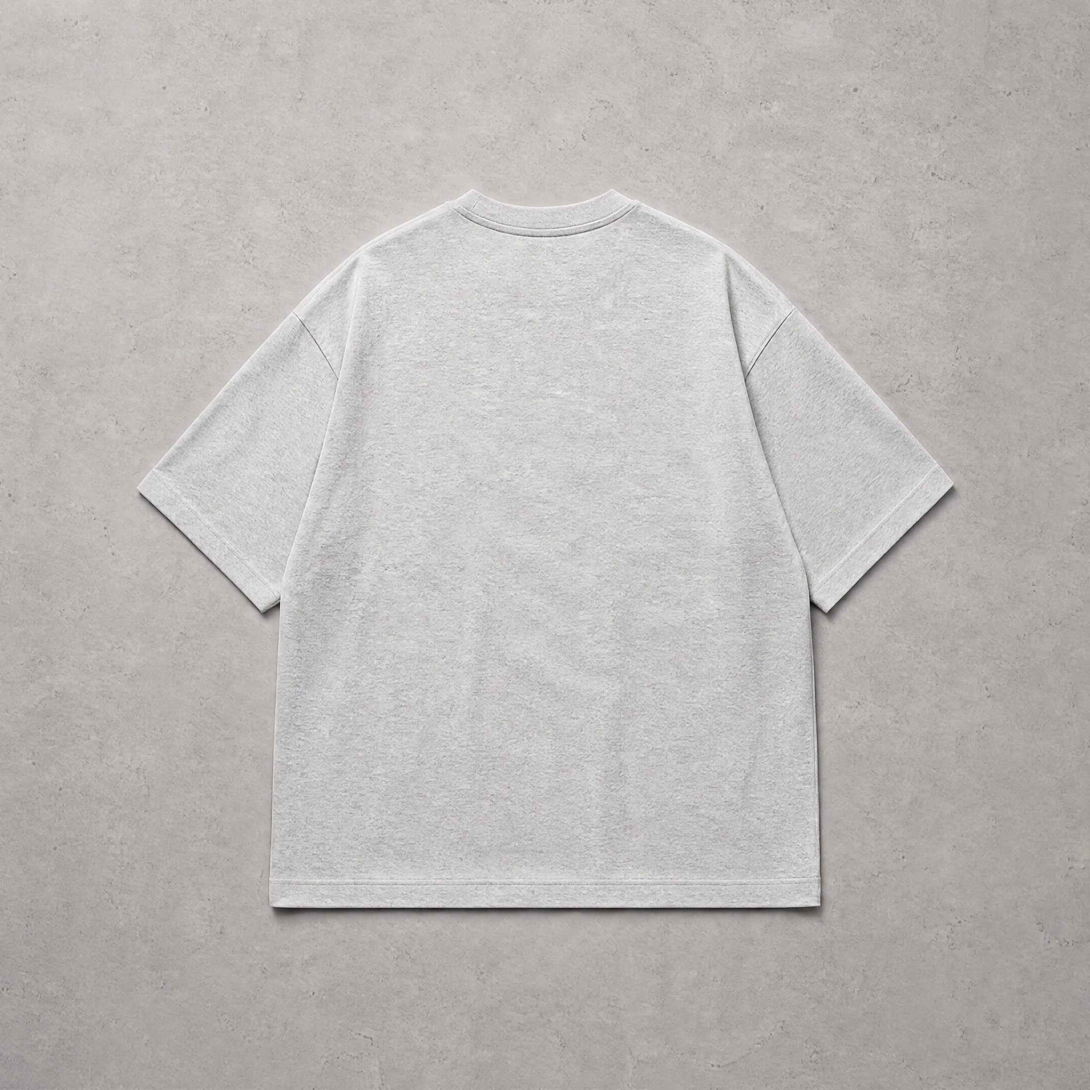A light gray short-sleeve t-shirt shown from the back, laid flat on a textured gray background.