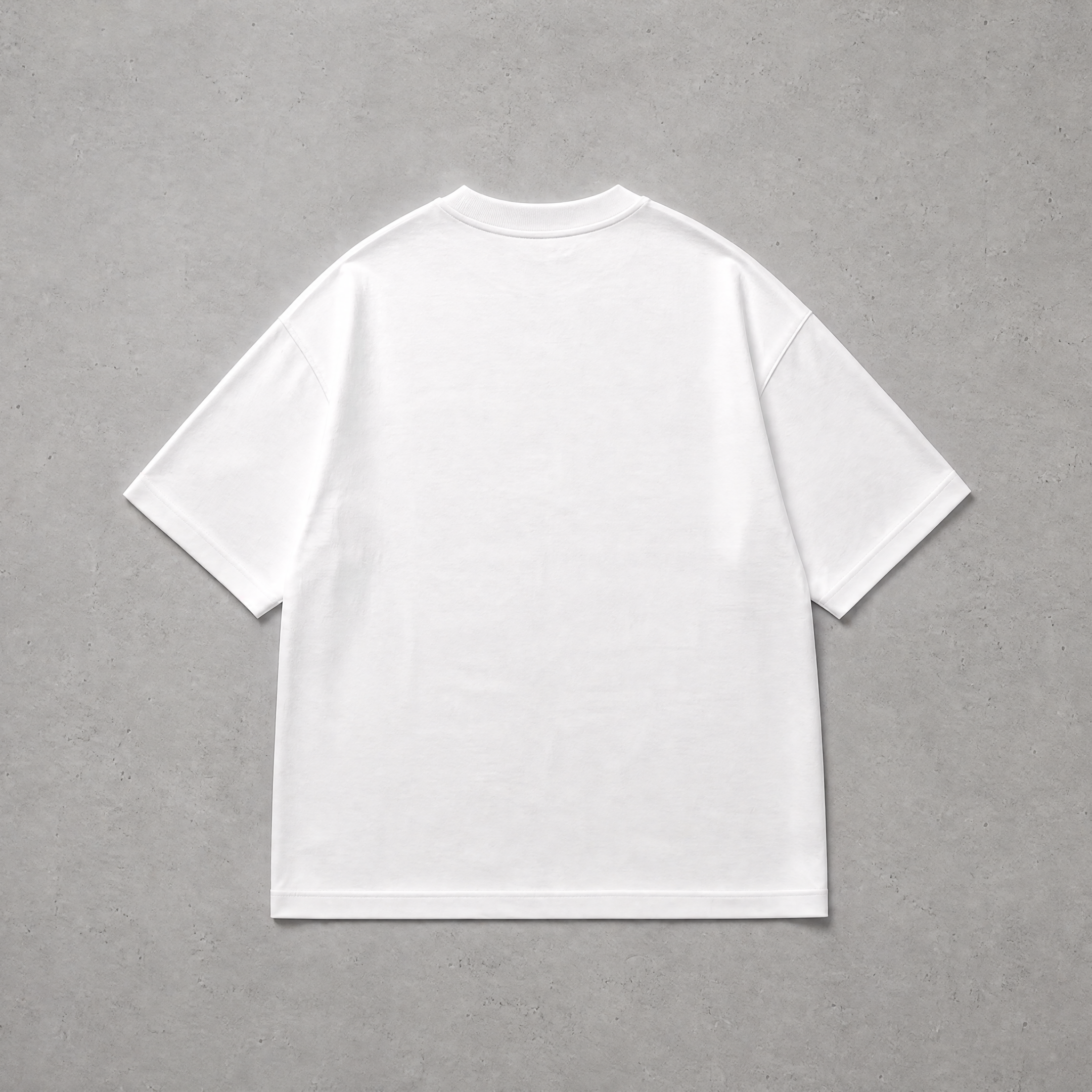 A plain white short-sleeve crewneck T-shirt shown from the back, laid flat on a textured gray background.